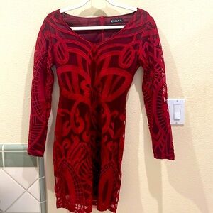 more like size 2/4. cute, darker, red almost burgundy, built-in sheer slip